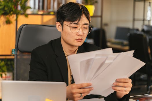 self-employed professional reviewing financial documents