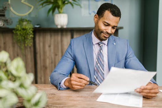 man shaking hands with mortgage broker