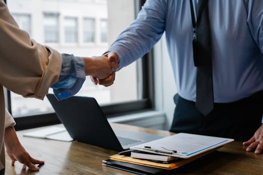 handshake between a lender and borrower