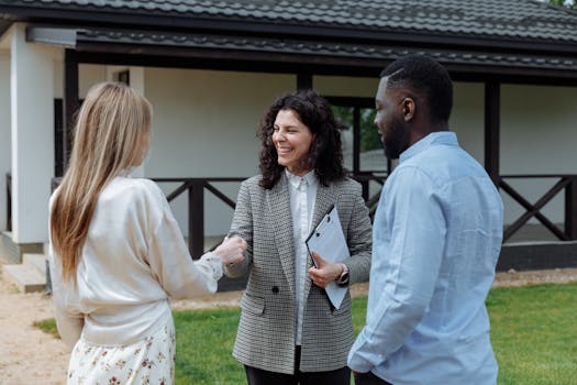 two friends discussing a property purchase