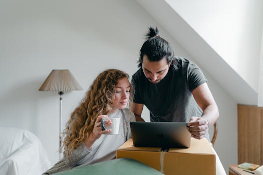 Homeowner reviewing mortgage statements on a laptop