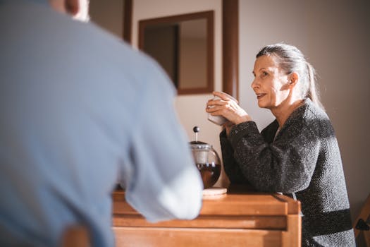 person using laptop to compare insurance policies