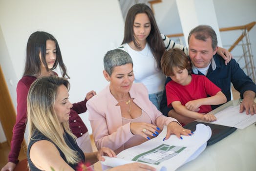 family reviewing financial documents at home