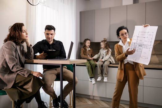 family discussing financial goals at a kitchen table