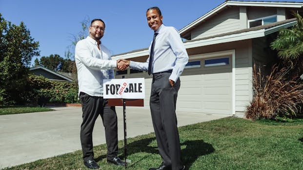 homeowner signing mortgage papers