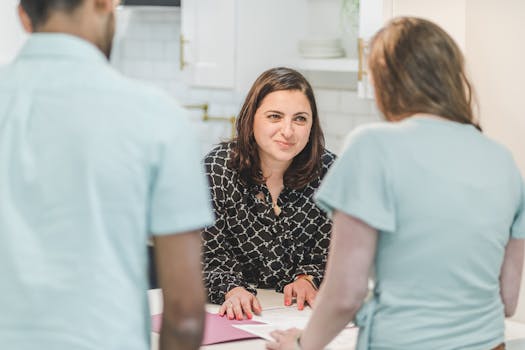 family discussing mortgage options with a financial advisor