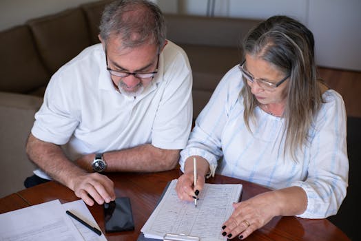 family discussing finances at kitchen table