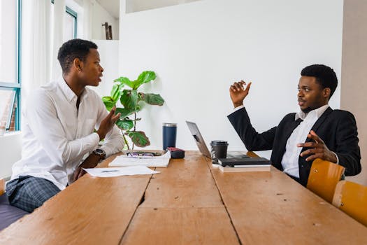 family discussing finances at a table