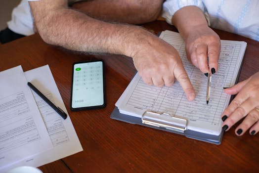 couple reviewing financial documents