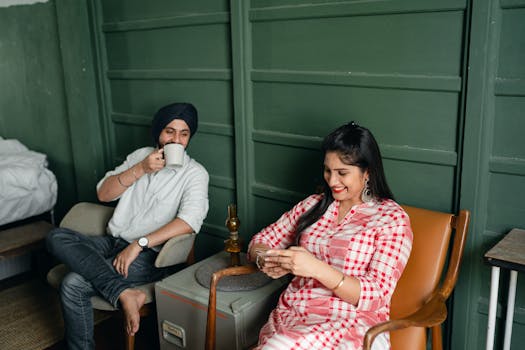 retired couple enjoying coffee on porch