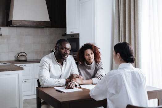 family discussing finances at kitchen table