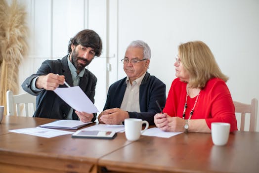 senior couple reviewing financial documents