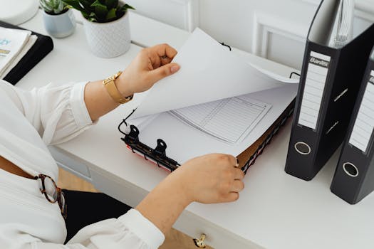 mortgage documents neatly organized on a desk