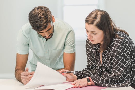 homebuyer signing mortgage documents